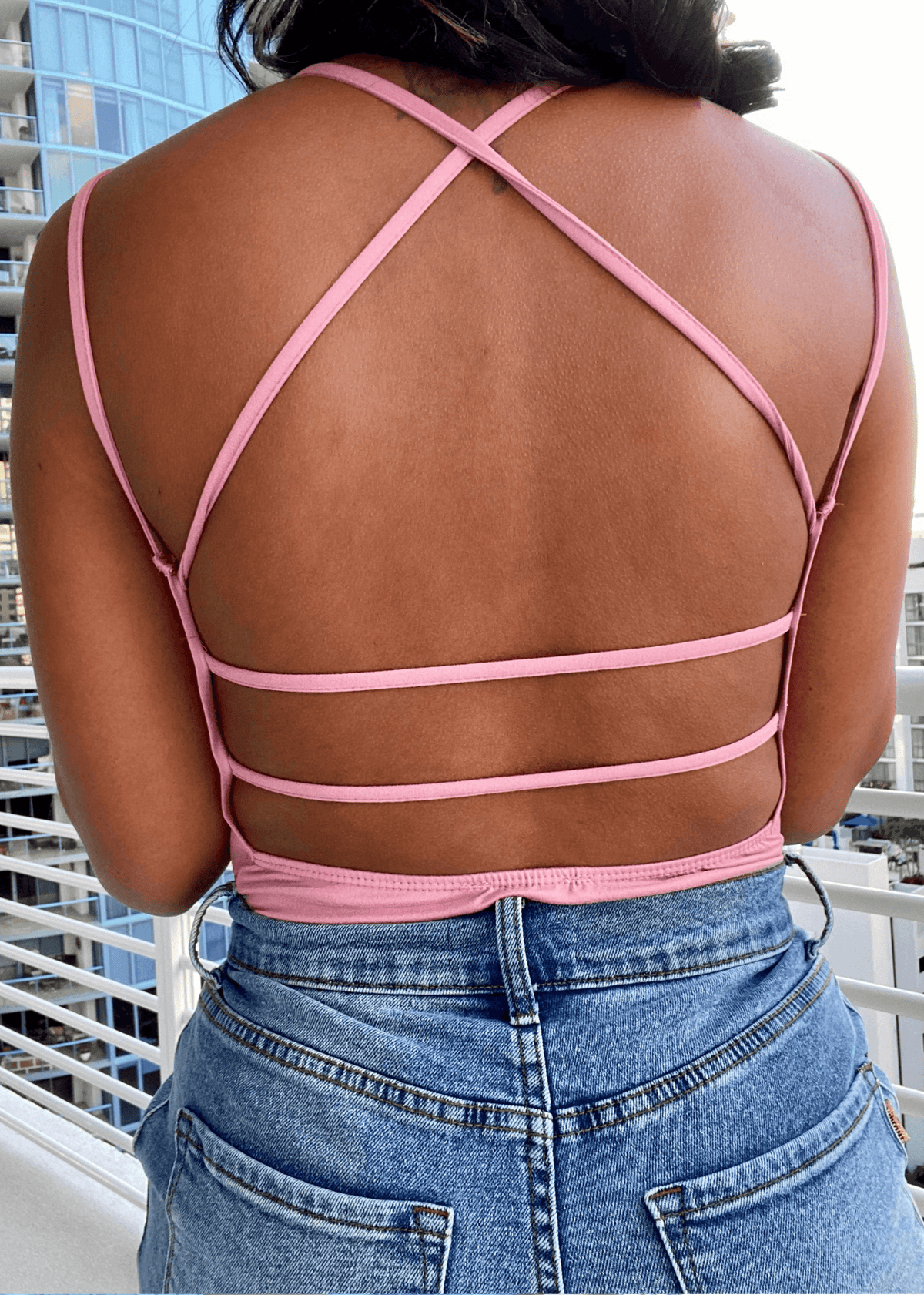 Get trendy with Criss-Cross Pink Bodysuit - Tops available at ELLE TENAJ. Grab yours for $10.00 today!