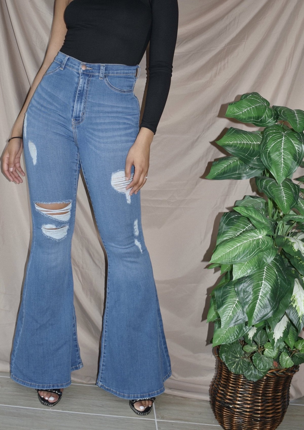 Get trendy with Fiesty Flare High Waisted Dark Blue Jeans - Bottoms available at ELLE TENAJ. Grab yours for $20 today!