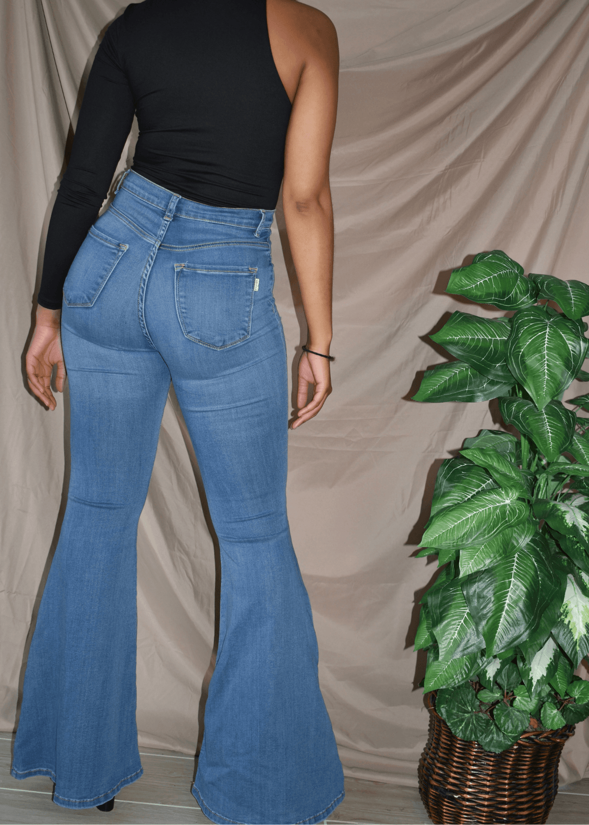 Get trendy with Fiesty Flare High Waisted Dark Blue Jeans - Bottoms available at ELLE TENAJ. Grab yours for $20.00 today!