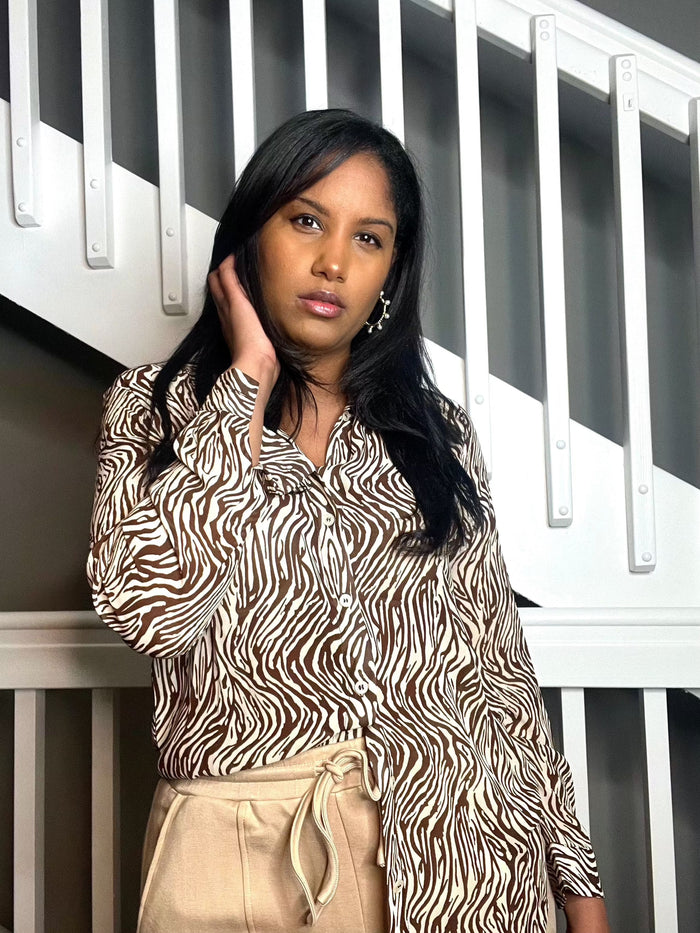 Get trendy with Zebra Print Brown Button Down Top - Tops available at ELLE TENAJ. Grab yours for $20.00 today!