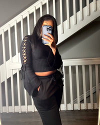 Get trendy with Black Turtleneck Lace up Sweater - Tops available at ELLE TENAJ. Grab yours for $29.00 today!